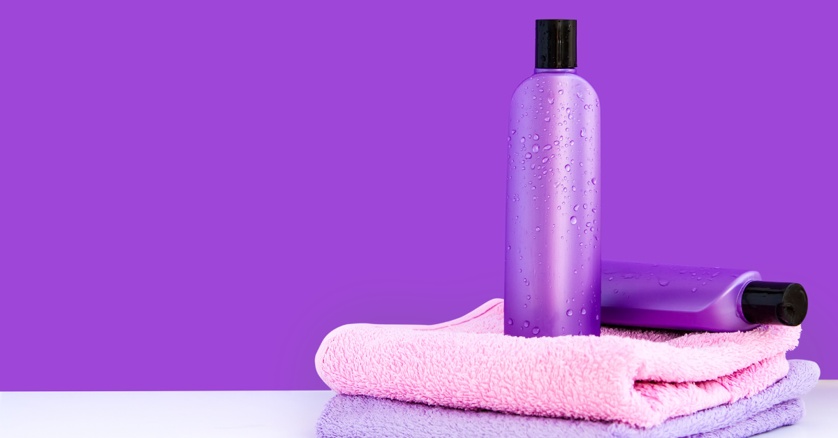 Shampoo bottles on towels